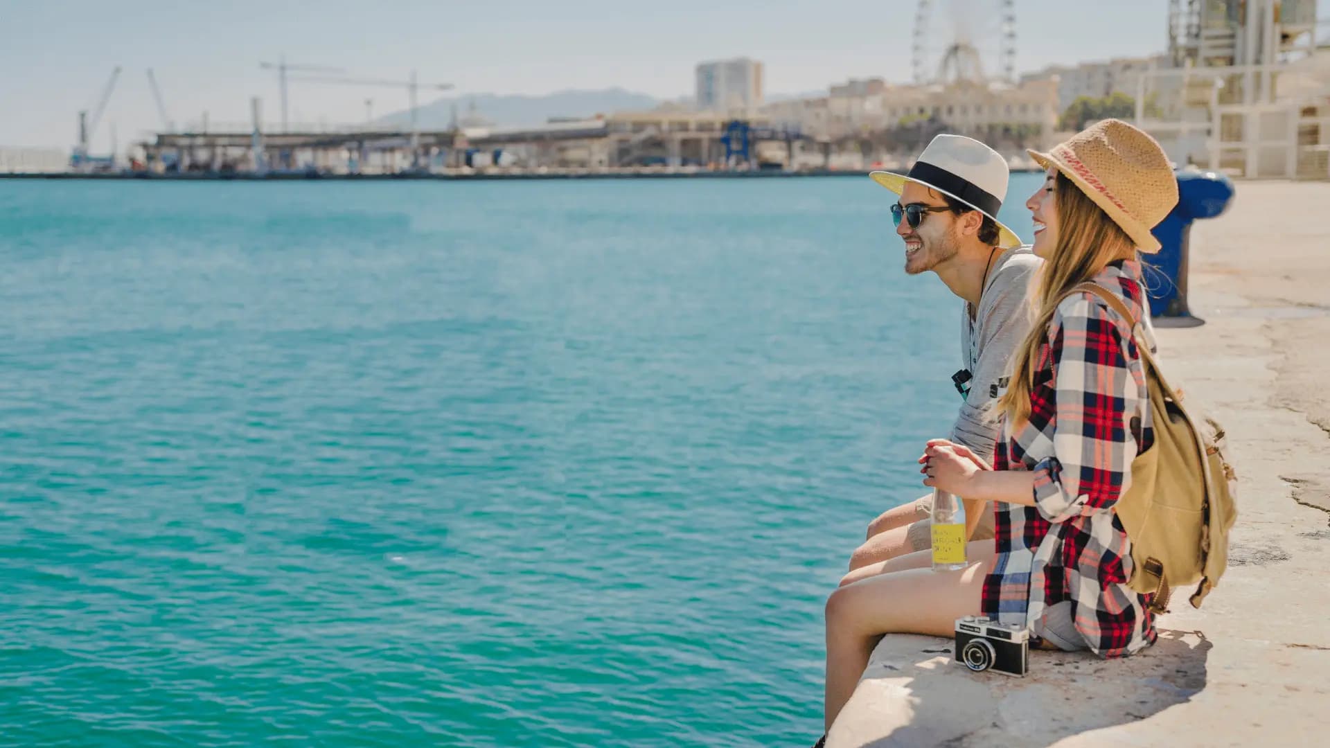 Tourist enjoying Dubai skyline view with Burj Khalifa and modern skyscrapers